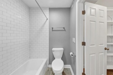 Beautifully renovated end unit with sleek new kitchen featuring on Cross Creek Golf Course in Georgia - for sale on GolfHomes.com, golf home, golf lot