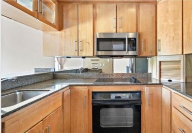 Welcome to your dream waterfront condo just steps away from the on Beau Chene Country Club in Louisiana - for sale on GolfHomes.com, golf home, golf lot