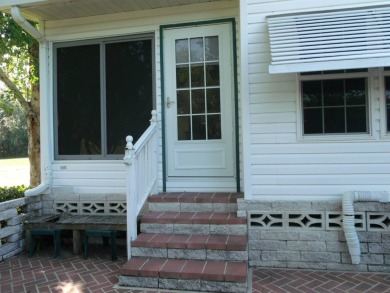 Exquisite 3-Bedroom Palm Harbor Home on the Golf Course! on Schalamar Creek Golf and Country Club in Florida - for sale on GolfHomes.com, golf home, golf lot