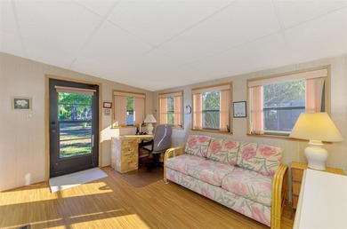 Location, Location, Location!! This wonderful two bed 2 two bath on Sabal Trace Golf and Country Club in Florida - for sale on GolfHomes.com, golf home, golf lot