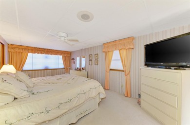 Location, Location, Location!! This wonderful two bed 2 two bath on Sabal Trace Golf and Country Club in Florida - for sale on GolfHomes.com, golf home, golf lot