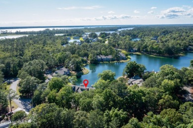 Welcome to your waterfront oasis at 7172 

Upon arrival on Harbour Point Golf Club in North Carolina - for sale on GolfHomes.com, golf home, golf lot