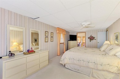 Location, Location, Location!! This wonderful two bed 2 two bath on Sabal Trace Golf and Country Club in Florida - for sale on GolfHomes.com, golf home, golf lot