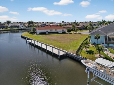 PRICED COMPETITIVELY! PRIME WATERFRONT KEY LOT! GREAT LOCATION on Twin Isles Country Club in Florida - for sale on GolfHomes.com, golf home, golf lot