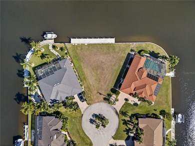 PRICED COMPETITIVELY! PRIME WATERFRONT KEY LOT! GREAT LOCATION on Twin Isles Country Club in Florida - for sale on GolfHomes.com, golf home, golf lot