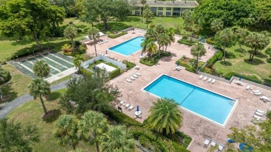 This spacious 5th-floor, 3 Beds, 2 Baths, condo offers 1,500 on Palm-Aire Country Club and Resort - Palms in Florida - for sale on GolfHomes.com, golf home, golf lot