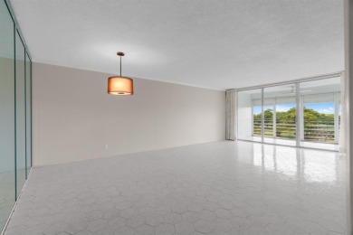 This spacious 5th-floor, 3 Beds, 2 Baths, condo offers 1,500 on Palm-Aire Country Club and Resort - Palms in Florida - for sale on GolfHomes.com, golf home, golf lot