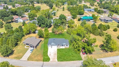 Welcome to this beautiful three-bedroom, two-bathroom new on Holiday Island Executive Golf Course in Arkansas - for sale on GolfHomes.com, golf home, golf lot