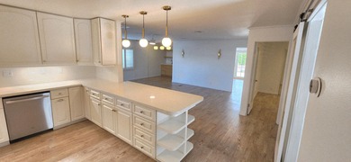 This tastefully remodeled home boasts a wide range of on Palm Desert Greens Country Club in California - for sale on GolfHomes.com, golf home, golf lot