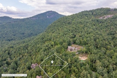 This homesite offers a rare blend of mountain scenery and on The Country Club of Sapphire Valley in North Carolina - for sale on GolfHomes.com, golf home, golf lot