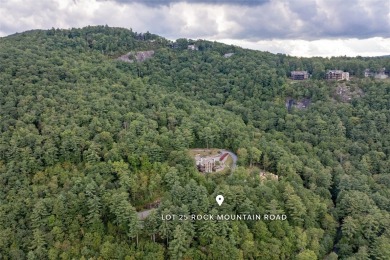 This homesite offers a rare blend of mountain scenery and on The Country Club of Sapphire Valley in North Carolina - for sale on GolfHomes.com, golf home, golf lot