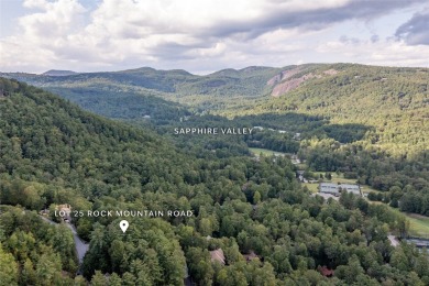 This homesite offers a rare blend of mountain scenery and on The Country Club of Sapphire Valley in North Carolina - for sale on GolfHomes.com, golf home, golf lot