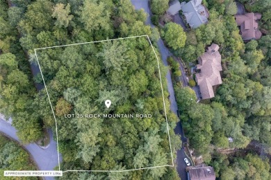 This homesite offers a rare blend of mountain scenery and on The Country Club of Sapphire Valley in North Carolina - for sale on GolfHomes.com, golf home, golf lot