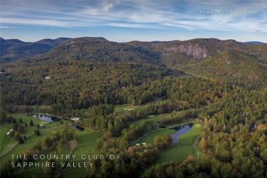 This homesite offers a rare blend of mountain scenery and on The Country Club of Sapphire Valley in North Carolina - for sale on GolfHomes.com, golf home, golf lot