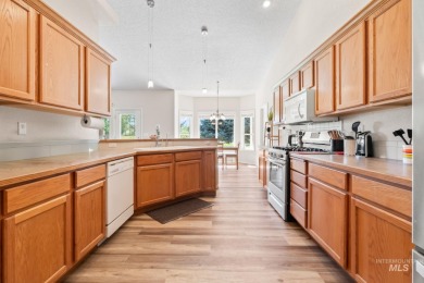 This lovely single level home in a gated community offers easy on Ridgecrest Golf Course in Idaho - for sale on GolfHomes.com, golf home, golf lot