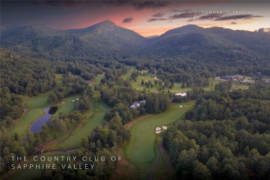 This homesite offers a rare blend of mountain scenery and on The Country Club of Sapphire Valley in North Carolina - for sale on GolfHomes.com, golf home, golf lot