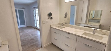 This tastefully remodeled home boasts a wide range of on Palm Desert Greens Country Club in California - for sale on GolfHomes.com, golf home, golf lot