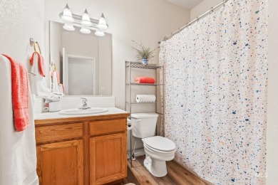 This lovely single level home in a gated community offers easy on Ridgecrest Golf Course in Idaho - for sale on GolfHomes.com, golf home, golf lot