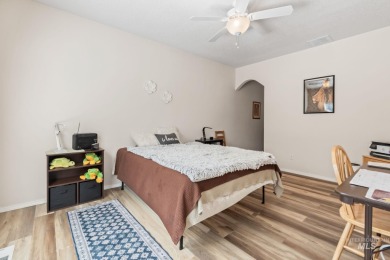 This lovely single level home in a gated community offers easy on Ridgecrest Golf Course in Idaho - for sale on GolfHomes.com, golf home, golf lot