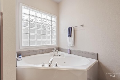 This lovely single level home in a gated community offers easy on Ridgecrest Golf Course in Idaho - for sale on GolfHomes.com, golf home, golf lot