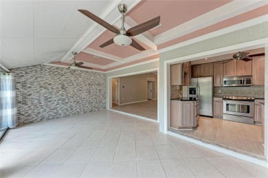 Welcome to Timber Creek--where every day feels like a retreat on Timber Creek Golf Course in Florida - for sale on GolfHomes.com, golf home, golf lot
