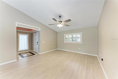 Welcome to Timber Creek--where every day feels like a retreat on Timber Creek Golf Course in Florida - for sale on GolfHomes.com, golf home, golf lot