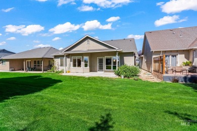 This lovely single level home in a gated community offers easy on Ridgecrest Golf Course in Idaho - for sale on GolfHomes.com, golf home, golf lot