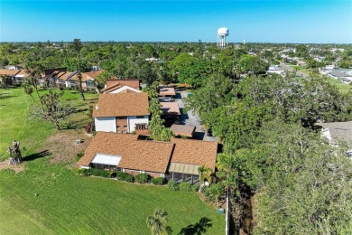 Welcome to Timber Creek--where every day feels like a retreat on Timber Creek Golf Course in Florida - for sale on GolfHomes.com, golf home, golf lot