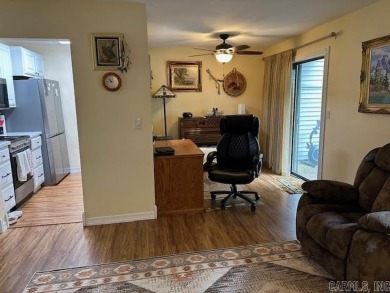 Discover the allure of modern living in this beautifully on Indian Hills Country Club in Arkansas - for sale on GolfHomes.com, golf home, golf lot