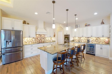 Stunning 3-bedroom, 3-bath Pool Home with 3-car garage in highly on Deep Creek Golf Club in Florida - for sale on GolfHomes.com, golf home, golf lot