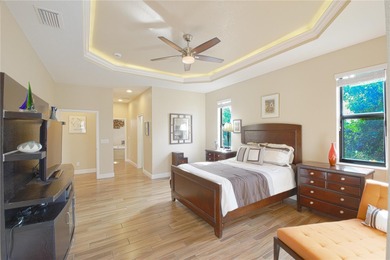 Stunning 3-bedroom, 3-bath Pool Home with 3-car garage in highly on Deep Creek Golf Club in Florida - for sale on GolfHomes.com, golf home, golf lot