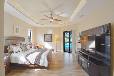 Stunning 3-bedroom, 3-bath Pool Home with 3-car garage in highly on Deep Creek Golf Club in Florida - for sale on GolfHomes.com, golf home, golf lot