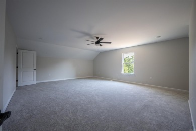 This stunning 5-bedroom, 3-bath brick home offers modern design on The Course At Eagle Mountain in Arkansas - for sale on GolfHomes.com, golf home, golf lot