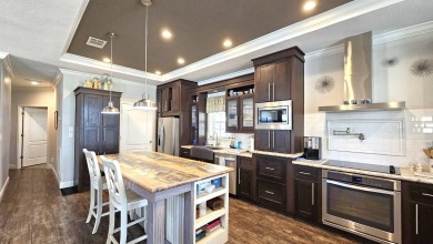 Welcome to this stunning 2018 manufactured home located in a on Blue Heron Pines Golf Course in Florida - for sale on GolfHomes.com, golf home, golf lot