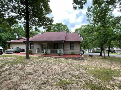 Excellent Crown lake views in this completely updated 4 bedroom on Cedar Glade Golf Course in Arkansas - for sale on GolfHomes.com, golf home, golf lot