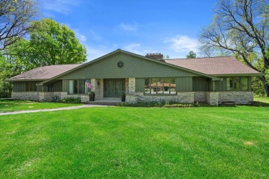 This sprawling Cedar sided w/accents of Lannon stone Ranch is on Whitnall Park Golf Club in Wisconsin - for sale on GolfHomes.com, golf home, golf lot