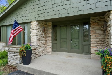 This sprawling Cedar sided w/accents of Lannon stone Ranch is on Whitnall Park Golf Club in Wisconsin - for sale on GolfHomes.com, golf home, golf lot