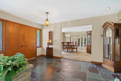 This sprawling Cedar sided w/accents of Lannon stone Ranch is on Whitnall Park Golf Club in Wisconsin - for sale on GolfHomes.com, golf home, golf lot