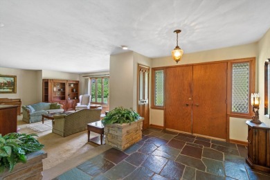 This sprawling Cedar sided w/accents of Lannon stone Ranch is on Whitnall Park Golf Club in Wisconsin - for sale on GolfHomes.com, golf home, golf lot