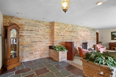 This sprawling Cedar sided w/accents of Lannon stone Ranch is on Whitnall Park Golf Club in Wisconsin - for sale on GolfHomes.com, golf home, golf lot