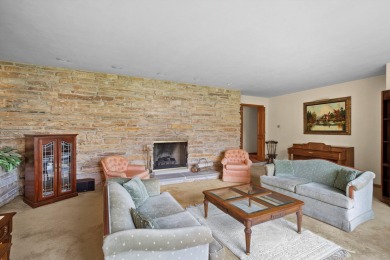 This sprawling Cedar sided w/accents of Lannon stone Ranch is on Whitnall Park Golf Club in Wisconsin - for sale on GolfHomes.com, golf home, golf lot