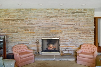 This sprawling Cedar sided w/accents of Lannon stone Ranch is on Whitnall Park Golf Club in Wisconsin - for sale on GolfHomes.com, golf home, golf lot