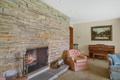 This sprawling Cedar sided w/accents of Lannon stone Ranch is on Whitnall Park Golf Club in Wisconsin - for sale on GolfHomes.com, golf home, golf lot
