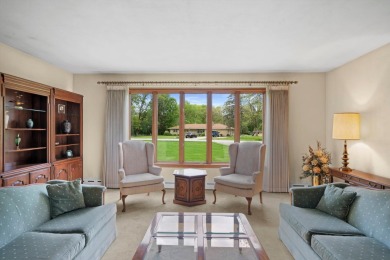 This sprawling Cedar sided w/accents of Lannon stone Ranch is on Whitnall Park Golf Club in Wisconsin - for sale on GolfHomes.com, golf home, golf lot