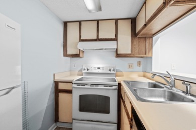 This North Myrtle Beach condo is a perfect beachside retreat on Possum Trot Golf Course in South Carolina - for sale on GolfHomes.com, golf home, golf lot