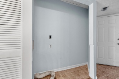This North Myrtle Beach condo is a perfect beachside retreat on Possum Trot Golf Course in South Carolina - for sale on GolfHomes.com, golf home, golf lot