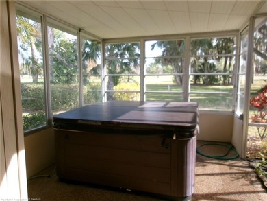 Enjoy tranquil, nearly endless golf course views from this on Sebring Golf Club in Florida - for sale on GolfHomes.com, golf home, golf lot