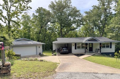 Updated 3 bedroom 1.5 bath house on about 0.6 acres, with a on Cherokee Village North Course in Arkansas - for sale on GolfHomes.com, golf home, golf lot