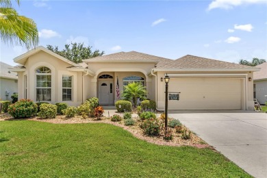 Welcome to your ideal home in The Villages, a vibrant 55+ on El Santiago Executive Golf Course in Florida - for sale on GolfHomes.com, golf home, golf lot