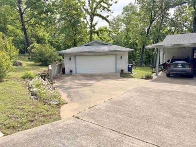 Updated 3 bedroom 1.5 bath house on about 0.6 acres, with a on Cherokee Village North Course in Arkansas - for sale on GolfHomes.com, golf home, golf lot